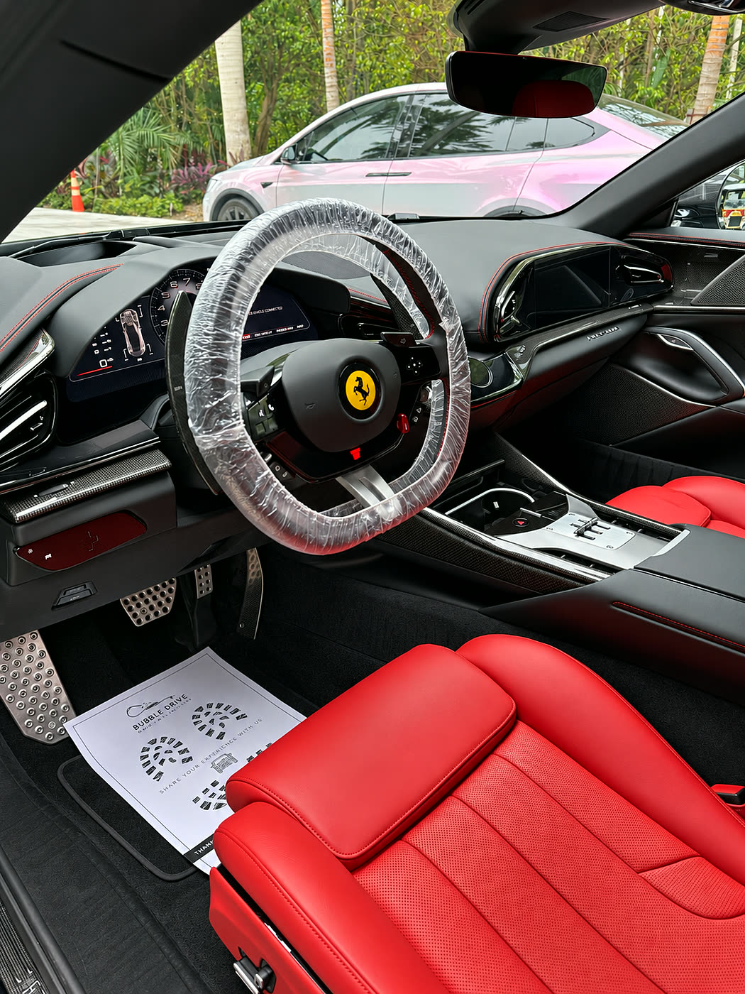 Red Ferrari leather interior after full interior detailing